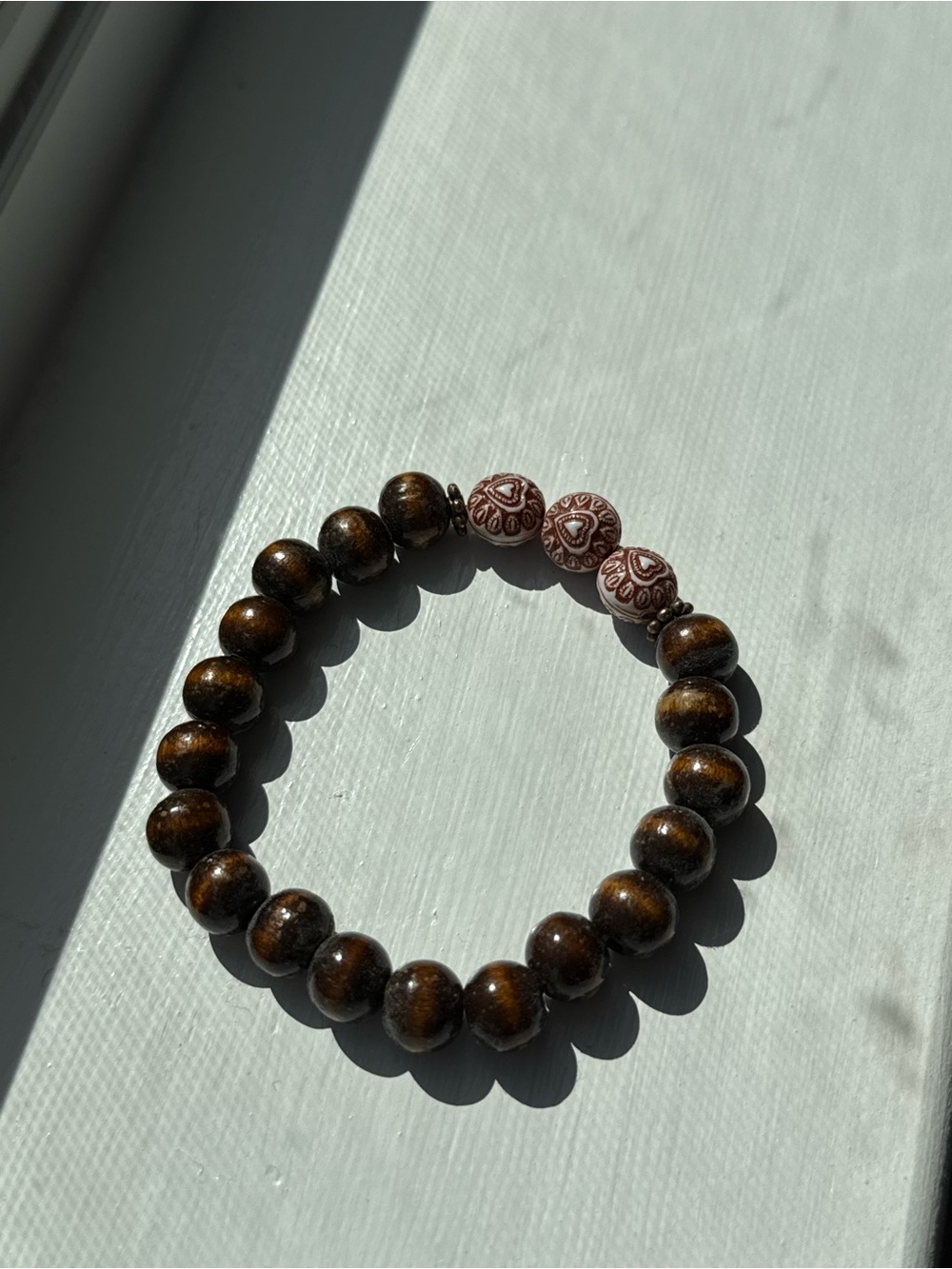 Handmade Brown Wood Bead Bracelet with Pink Accent Beads